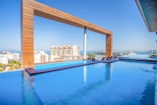 NEW 1 BR in Romantica w/rooftop pool & gym